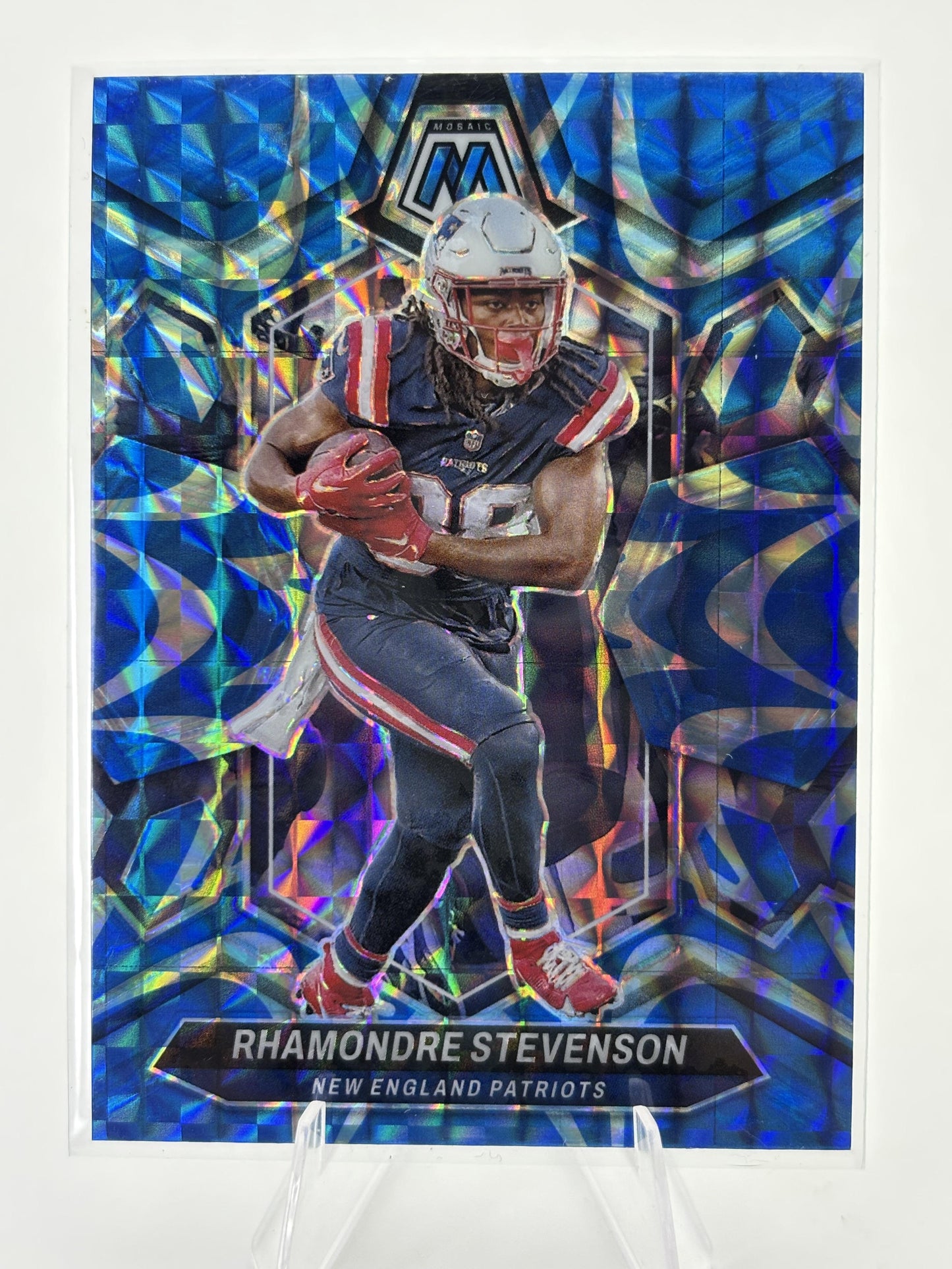 2024 Panini Mosaic #149 Rhamondre Stevenson Mosaic Reactive Blue